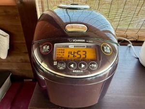 a toaster sitting on top of a table at IZU Elysian View in Koura