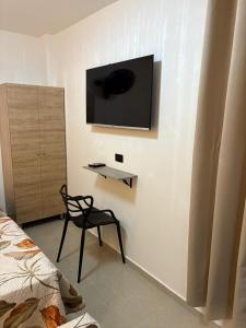 TV a/nebo společenská místnost v ubytování Hotel Lesus