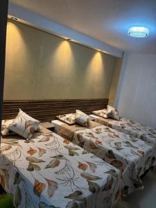 Postel nebo postele na pokoji v ubytování Hotel Lesus