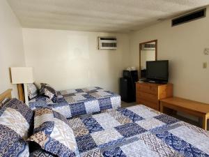 Postel nebo postele na pokoji v ubytování Budget Inn Durango