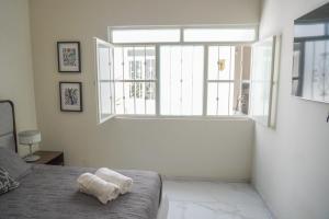 Postel nebo postele na pokoji v ubytování Departamento Vintage