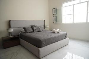 Postel nebo postele na pokoji v ubytování Departamento Vintage