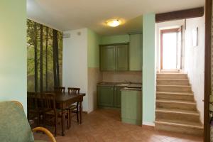 Kuchyň nebo kuchyňský kout v ubytování Casa Vacanza Le Case