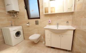 Koupelna v ubytování Apartments Maruchita