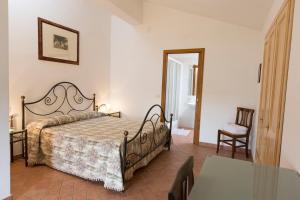 Postel nebo postele na pokoji v ubytování Casa Vacanza Le Case