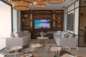 a living room with a couch and a table at Beachfront apartment in Tampico