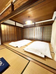 Postelja oz. postelje v sobi nastanitve 天海 Tenkai 丸々貸切1日1組限定宇野駅から宿まで5分無料送迎有り