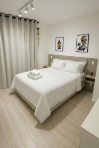 Ένα ή περισσότερα κρεβάτια σε δωμάτιο στο MV 126A Gracioso Apartamento Em Frente Ao Metrô Brás! - Rua Coronel Mursa, 56 - Brás