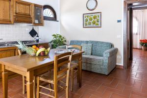 Kuchyň nebo kuchyňský kout v ubytování Corte Tommasi Residence