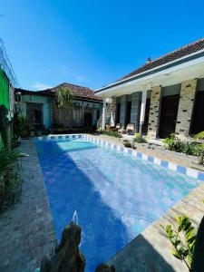 Bazén v ubytování Collection O Sanur Near Bali Exotic Marine Park nebo v jeho okolí
