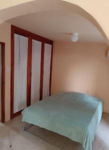 Postel nebo postele na pokoji v ubytování Acogedora casita en la playa