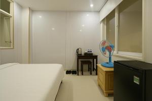 Postel nebo postele na pokoji v ubytování LAM ANH Hotel