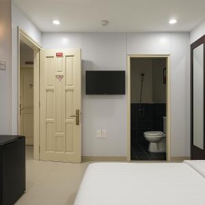 Postel nebo postele na pokoji v ubytování LAM ANH Hotel