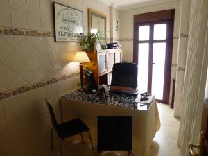 Kuchyň nebo kuchyňský kout v ubytování Hostel Conil