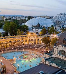 a large building with a fountain in front of it at Dream Destination Apartment in Budapest