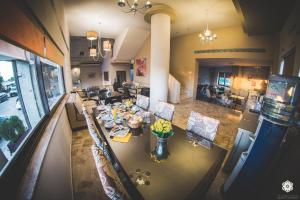 an aerial view of a dining room and living room at Aktaion Hotel in Igoumenitsa