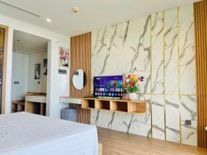 Billede fra billedgalleriet på Flamingo Hải Tiến - Phòng Deluxe giường King i Thanh Hóa