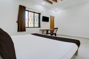 TV a/nebo společenská místnost v ubytování Hotel O Shree Prabhat