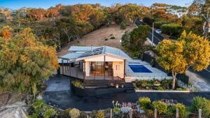 an aerial view of a house with a pool at Teringie Retreat with Breathtaking Views in Norton Summit