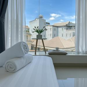 Postel nebo postele na pokoji v ubytování LAM ANH Hotel