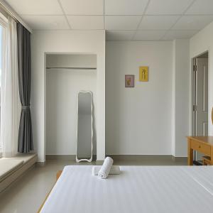 Postel nebo postele na pokoji v ubytování LAM ANH Hotel