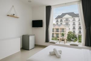TV a/nebo společenská místnost v ubytování LAM ANH Hotel
