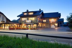 a building on the side of a street at Hotel SAMARIN Črnomelj in Črnomelj