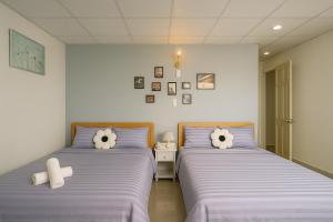 Postel nebo postele na pokoji v ubytování LAM ANH Hotel