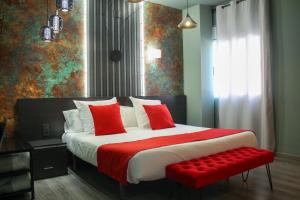 Postel nebo postele na pokoji v ubytování Hotel Pepo + 40 fotografií