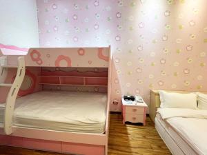 Letto o letti in una camera di Duoai Mineral Spring