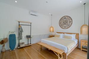 Ένα ή περισσότερα κρεβάτια σε δωμάτιο στο Villa Lemone by Bali Villa Solutions