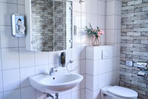 Koupelna v ubytování Hotel Maximo