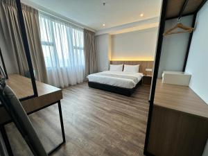 Voodi või voodid majutusasutuse 56 Hotel toas