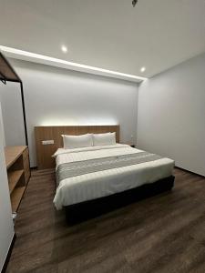 Voodi või voodid majutusasutuse 56 Hotel toas