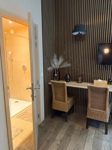 Fotografie z fotogalerie ubytování Hotel Giorgi et logements insolites-jacuzzi privé v destinaci Bastogne