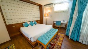 Ένα ή περισσότερα κρεβάτια σε δωμάτιο στο Lalit Service Apartment