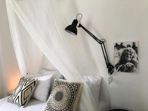 A bed or beds in a room at Studios Casa Liaya