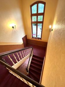 a view of a staircase in a building with a window at Villa Mila in Graal-Müritz