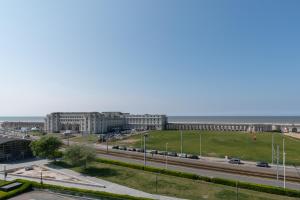 a view of a city with buildings and a highway at Penthouse Ostend with Seaview in Ostend