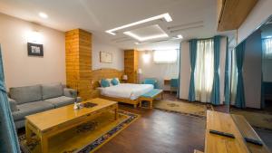 Χώρος καθιστικού στο Lalit Service Apartment