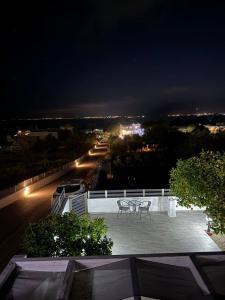 Fotografia z galérie ubytovania POUNEDES LUXURY SUITES v destinácii Pefkos