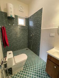 Koupelna v ubytování Inaara