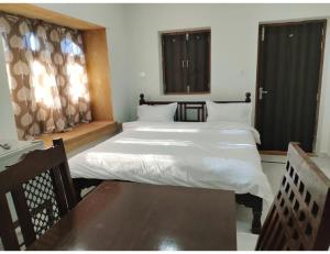 Hotel Namaste jaiselmer inn, Jaiselmer客房内的一张或多张床位