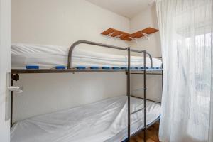 Una cama o camas en una habitación de L'Agathoise - Proche de la Plage 9 fotos más