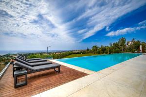 Billede fra billedgalleriet på J&C Villa Resort Seacave i Paphos City