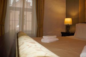 Krevet ili kreveti u jedinici u okviru objekta Taanilinna Hotell