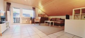 TV a/nebo společenská místnost v ubytování Ferienwohnung in Karlsbad