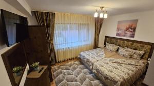 Postel nebo postele na pokoji v ubytování Villa Hills - къща за гости с храна + 37 fotografií