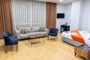 A bed or beds in a room at ZOOM HOTEL