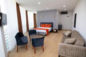 A bed or beds in a room at ZOOM HOTEL